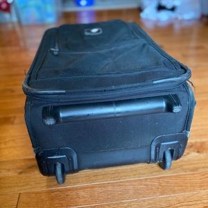 Black TUMI Carry on luggage